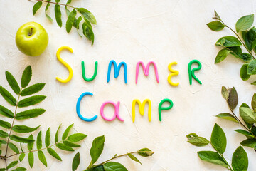 Summer Camp made of clay with green tree branches. Forest kids camp concept