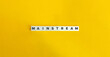 Mainstream Word on Block Letter Tiles on Yellow Background. Minimal Aesthetics.