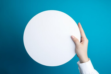 Poster - circle empty white mockup in hand on blue background generative ai