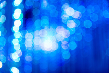 Wall Mural - Defocused lights with white and blue bokeh for Christmas background