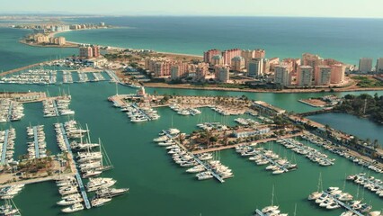 Poster - Aerial shot, drone point of view marina with nautical vessels of La Manga del Mar Menor. Travel and tourism concept. Spain