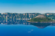Scenic view of Crater lake with reflections of the mountains, Oregon, USA, Oregon, USA