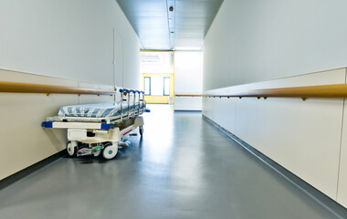 Poster - Empty hospital hallway with surgical transport equipment