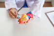 © mojo_cp - Cardiologist doctor hands holding stethoscope to checking heart model, Aging health care.