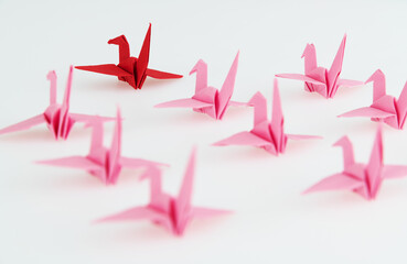 Wall Mural - Red origami paper cranes on white background