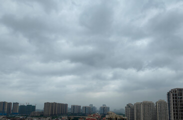 Wall Mural - dark clouds over the city