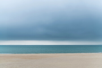 Wall Mural - dark cloudy sky above the sea