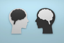 Two Human Heads With Black And White Brains In Opposition, Signifying Different Communication Styles Or Conflicting Perspectives On Blue Background. 3d Render.
