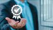 © Montri - Business Hand shows the sign of the top service Quality assurance. ISO certification and standardization concept, Guarantee, Standards, satisfaction, trust client, service experience,