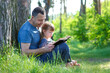 © Kostia - father and daughter reading bible book