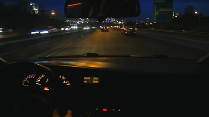night car driving on city highway at high speeds, overtaking other cars. pov. hd shot from car inter