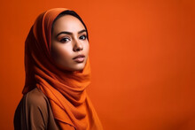 Portrait Of Woman Wearing Head Covering On Orange Studio Background With Copy Space. Generative AI