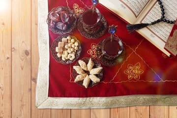 Ramadan holiday dried dates, tea and decor on desk