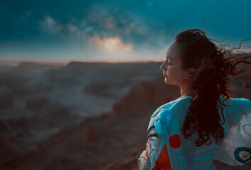Wall Mural - portrait woman standing at night in the valley of the moon in san pedro de atacama