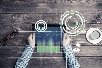 Poster - Business workplace with tablet device coffee cup and media graphs and diagrams