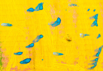 Wall Mural - Blue and yellow paint on paper. Abstract