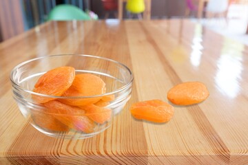 Wall Mural - Tasty Dried apricots fruits on the desk