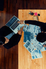 Poster - Top view analyst team discussing financial data on digital dashboard, analyzing chart and graph papers by data science software on wooden table background. Business intelligence and Fintech. Fervent