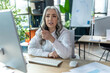© zinkevych - Business woman having a video conference and looking involved
