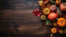 Thanksgiving Day Design Of A Collection Of Pumpkins And Other Vegetables On Brown Wood Table Background Top View