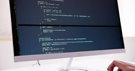 Fototapete - Computer Programmer Writing Program Code On Computer