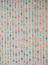 Colorful Beads Hanging On The Wall