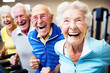 © Robert Kneschke - Group of happy seniors training in gym class (Generative AI)