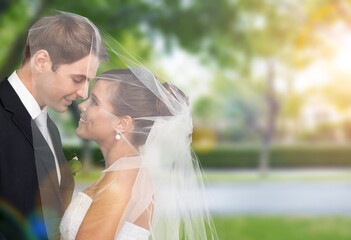 Canvas Print - Young happy wedding couple posing