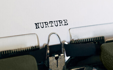 Poster - Text NURTURE typed on retro typewriter