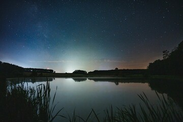 Wall Mural - Stunning nighttime landscape of a starry sky