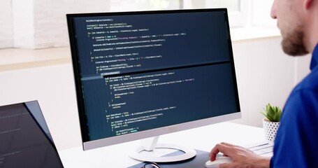 Fototapete - Computer Programmer Writing Program Code On Computer