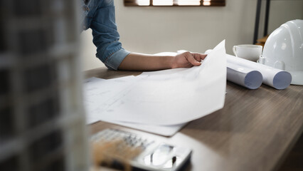 Wall Mural - Man architect working  On the desk.construction project ideas architects engineer Concept