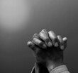 © herlanzer - praying to god with hands together with people stock photo