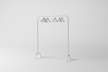 White clothes rail with hangers casting shadow on white background in greyscale monochrome. Illustration of the concept of minimalism, boutiques and fashion