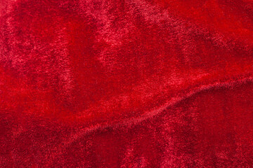 Red velvet background close up.