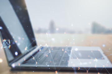 Poster - Double exposure of technology hologram on laptop background. Research and development software concept
