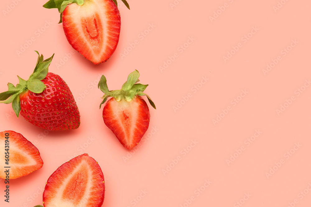 Slices of fresh strawberries on pink background