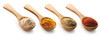 Set of various powder spices in a wooden spoon isolated on white background. Collection of close-up wooden spoons with curry, tumeric, cumin, pepper powder. Clipping path.