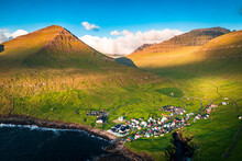 Aerial View Of The Coastal Village Of Gjogv And Mountains At Sunrise, Eysturoy Island, Faroe Islands, Denmark, Europe