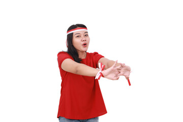 Young indonesian girl stretch her hands while celebrate indonesia independence day