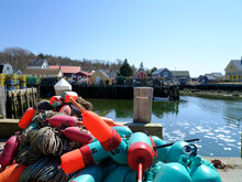 Colorful Lobster Floats Sit On A Dock On The Vinalhaven Island Maine