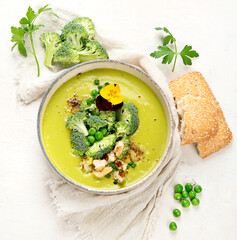 Wall Mural - Green soup. Broccoli cream soup. Healthy vegan dish. Top view