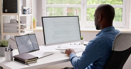 Fototapete - Computer Programmer Writing Program Code On Computer