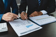 © crizzystudio - Group of business people meeting about business plans Present and analyze, discuss charts, financial graphs Growth of partners from documents and data on laptop computer at office.