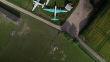Aerial View Birdseye Over De Havilland Museum Vintage Aircraft Fuselage Collection On Display On Rural Herefordshire Farmland