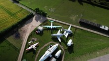 Aerial View Looking Down Over De Havilland Museum Vintage Aircraft Fuselage Collection On Display On Rural Herefordshire Farmland