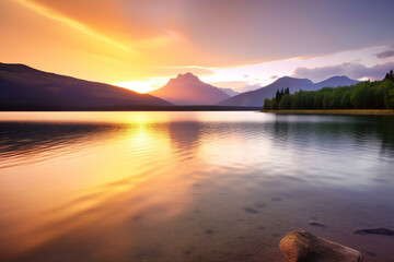 Wall Mural - a beautiful sunset over a lake with mountains in the background