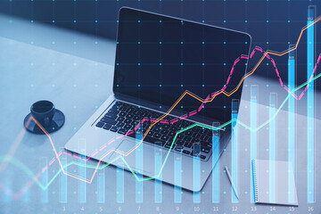Aufkleber - Close up of laptop on desk with coffee cup, notepad and growing business chart grid on blurry background. Corporate growth plan and company development concept. Double exposure.