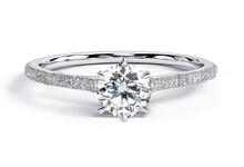 Diamond Solitaire Engagement Wedding Ring Isolated On White. Diamond Engagement Wedding Ring On Isolated White Background