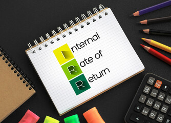 Poster - irr - internal rate of return acronym on notepad, business concept background
